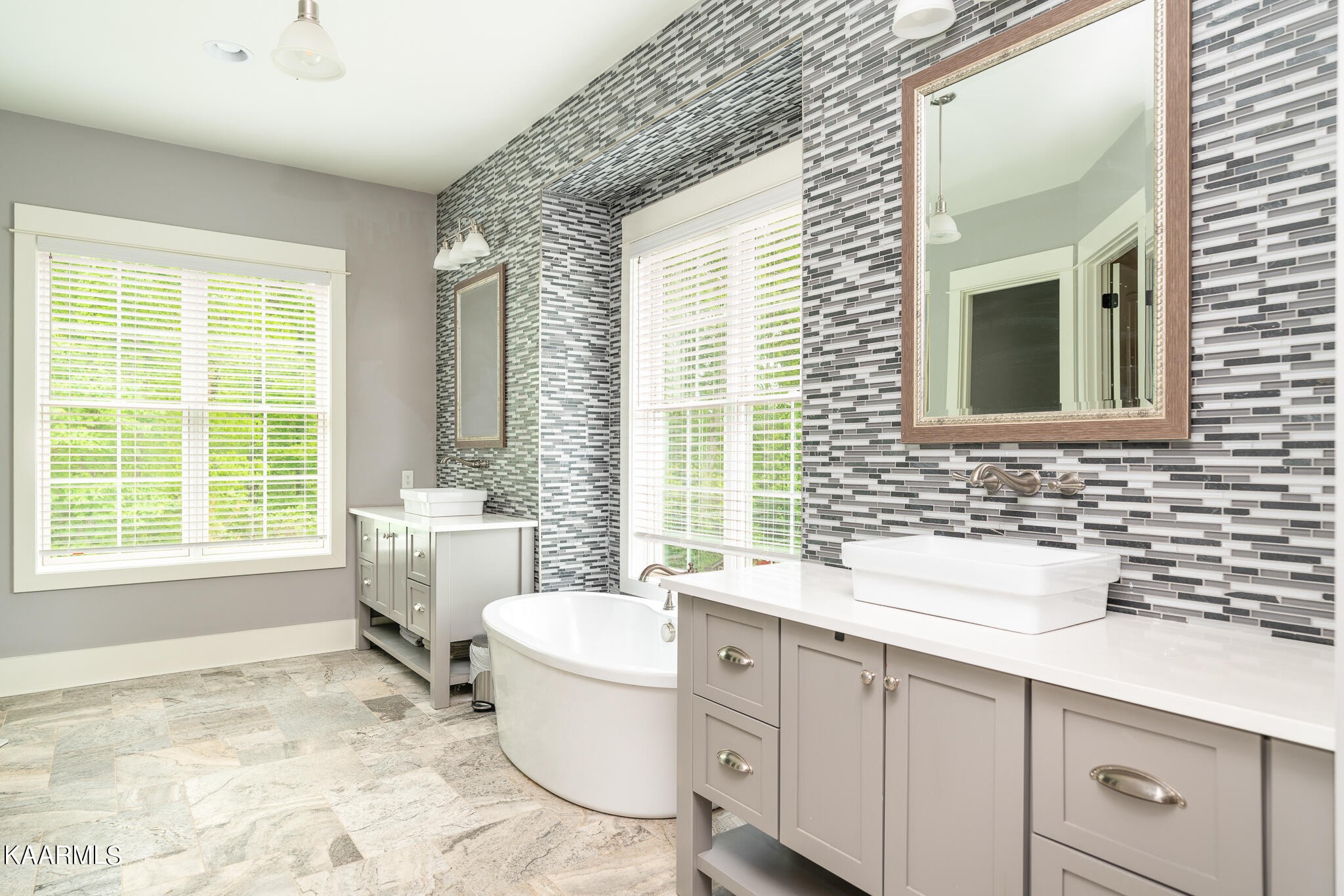 613 Dixon Road Lenoir City, TN 37772 - Photo 19 of 44 a bathroom with a sink toilet a mirror and bathtub