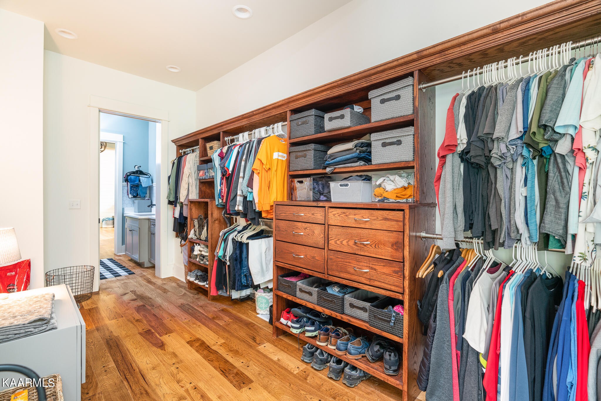 613 Dixon Road Lenoir City, TN 37772 - Photo 21 of 44 a view of walk in closet with clothes and shoes