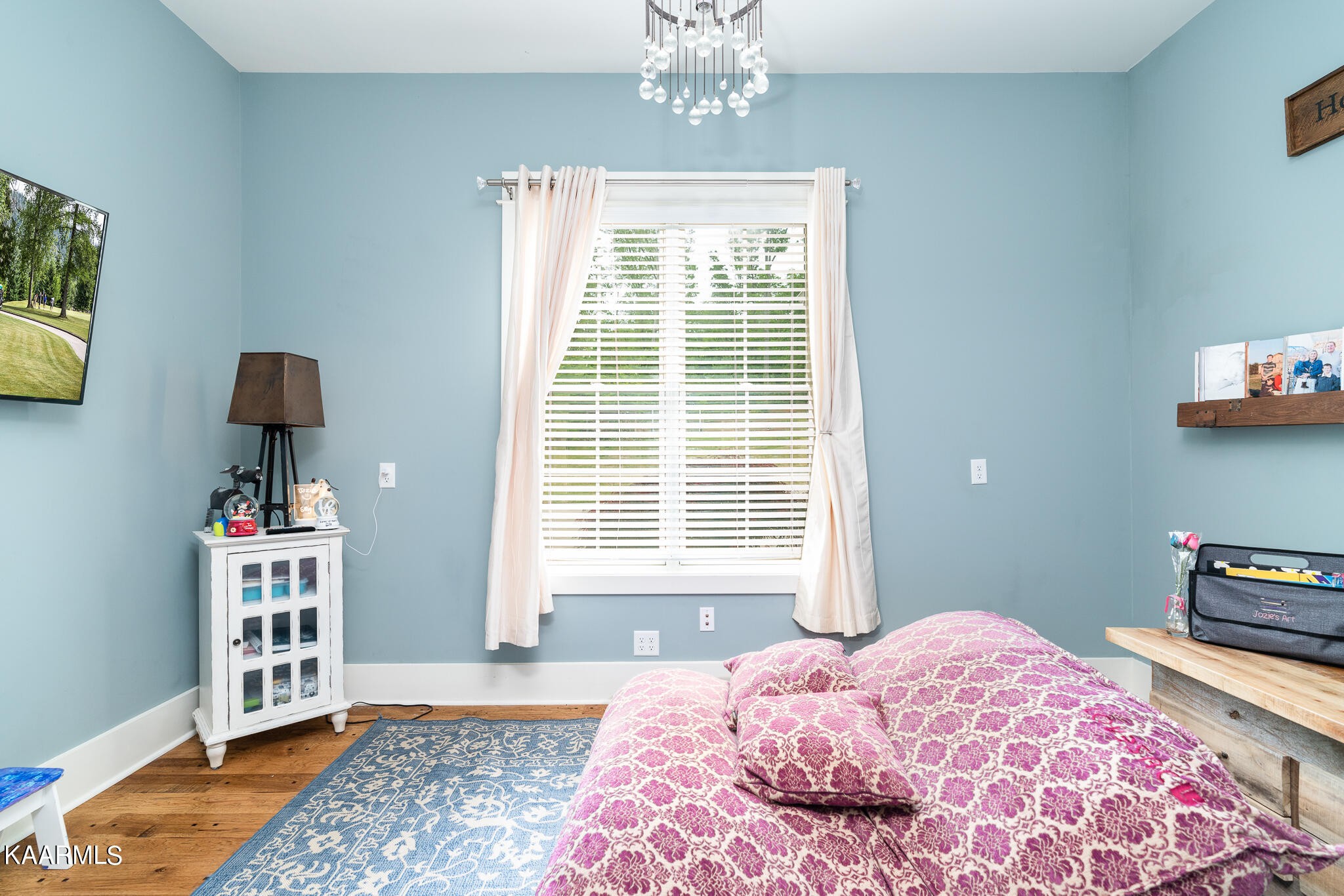 613 Dixon Road Lenoir City, TN 37772 - Photo 26 of 44 a bedroom with a bed and a window
