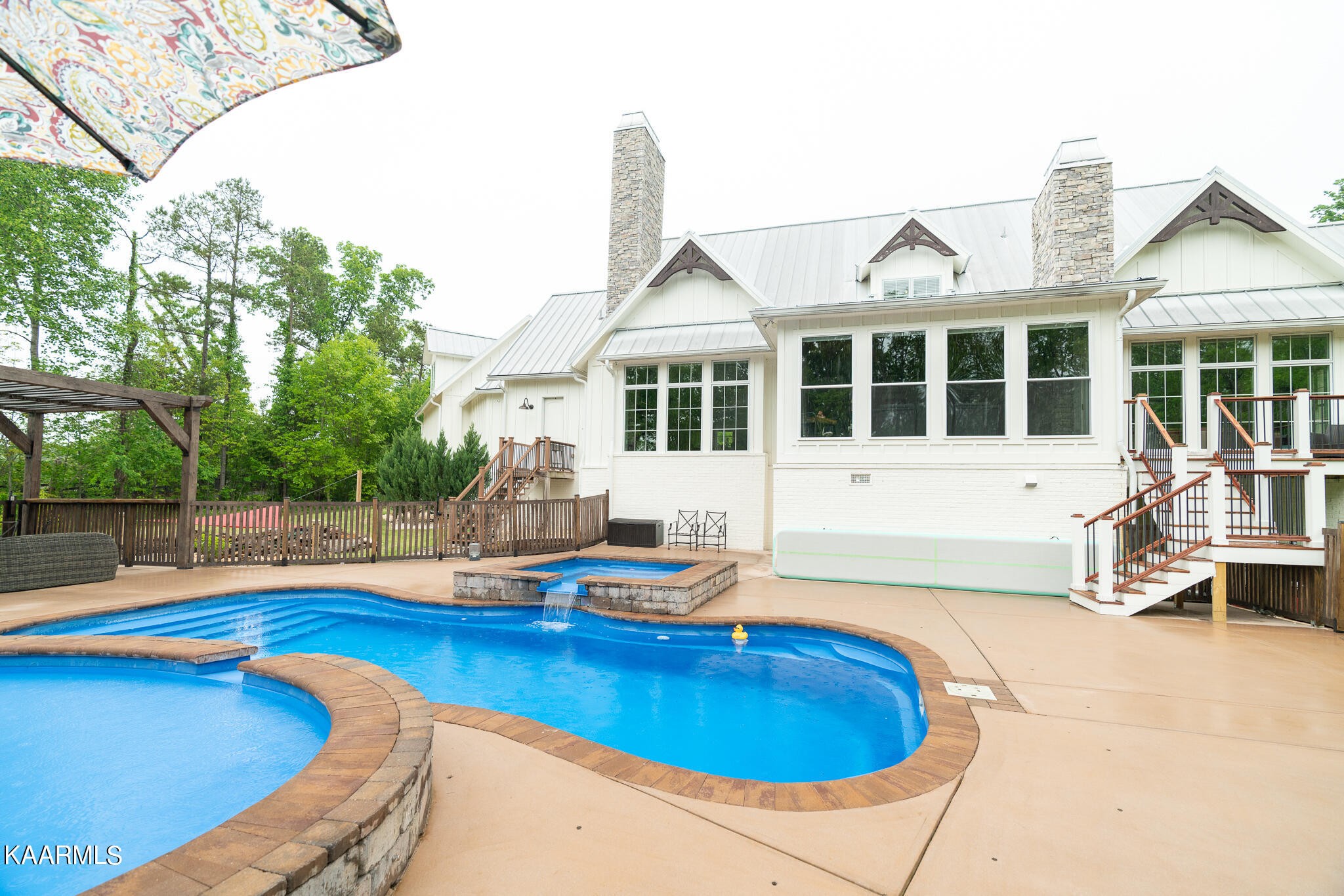 613 Dixon Road Lenoir City, TN 37772 - Photo 38 of 44 a house view with swimming pool and barbeque oven