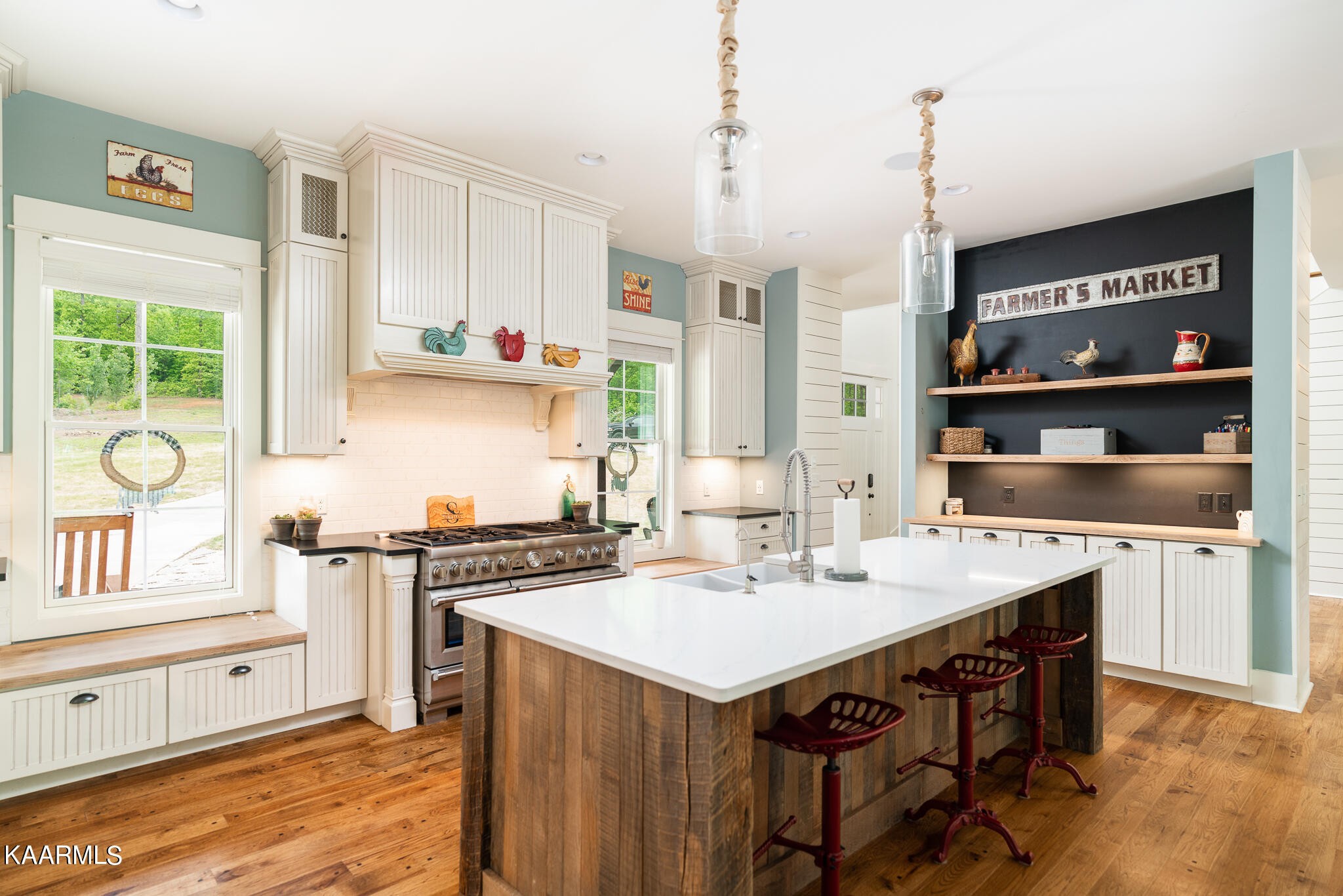613 Dixon Road Lenoir City, TN 37772 - Photo 8 of 44 a kitchen with a sink a stove and cabinets