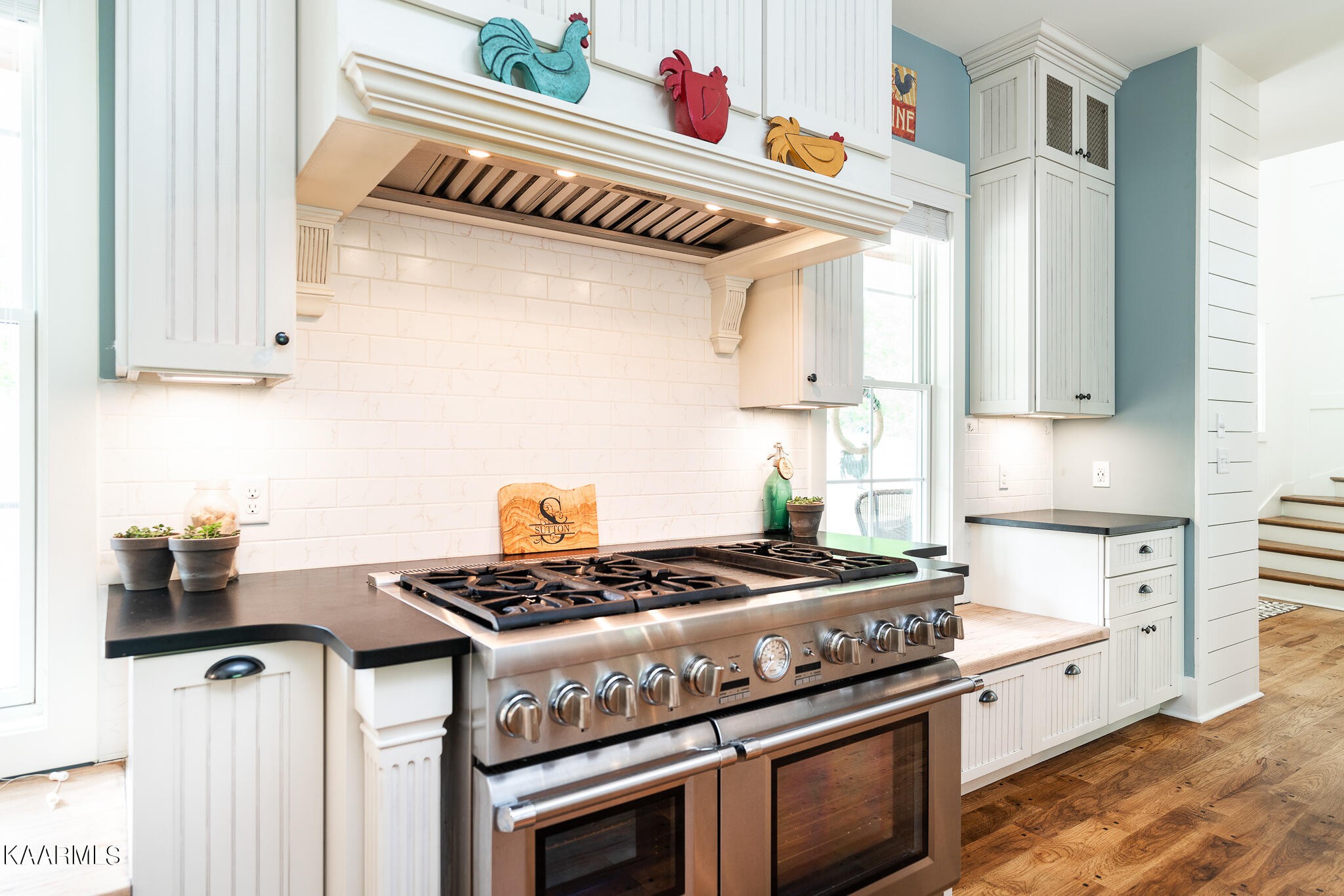 613 Dixon Road Lenoir City, TN 37772 - Photo 9 of 44 a kitchen with stainless steel appliances granite countertop a stove and a sink