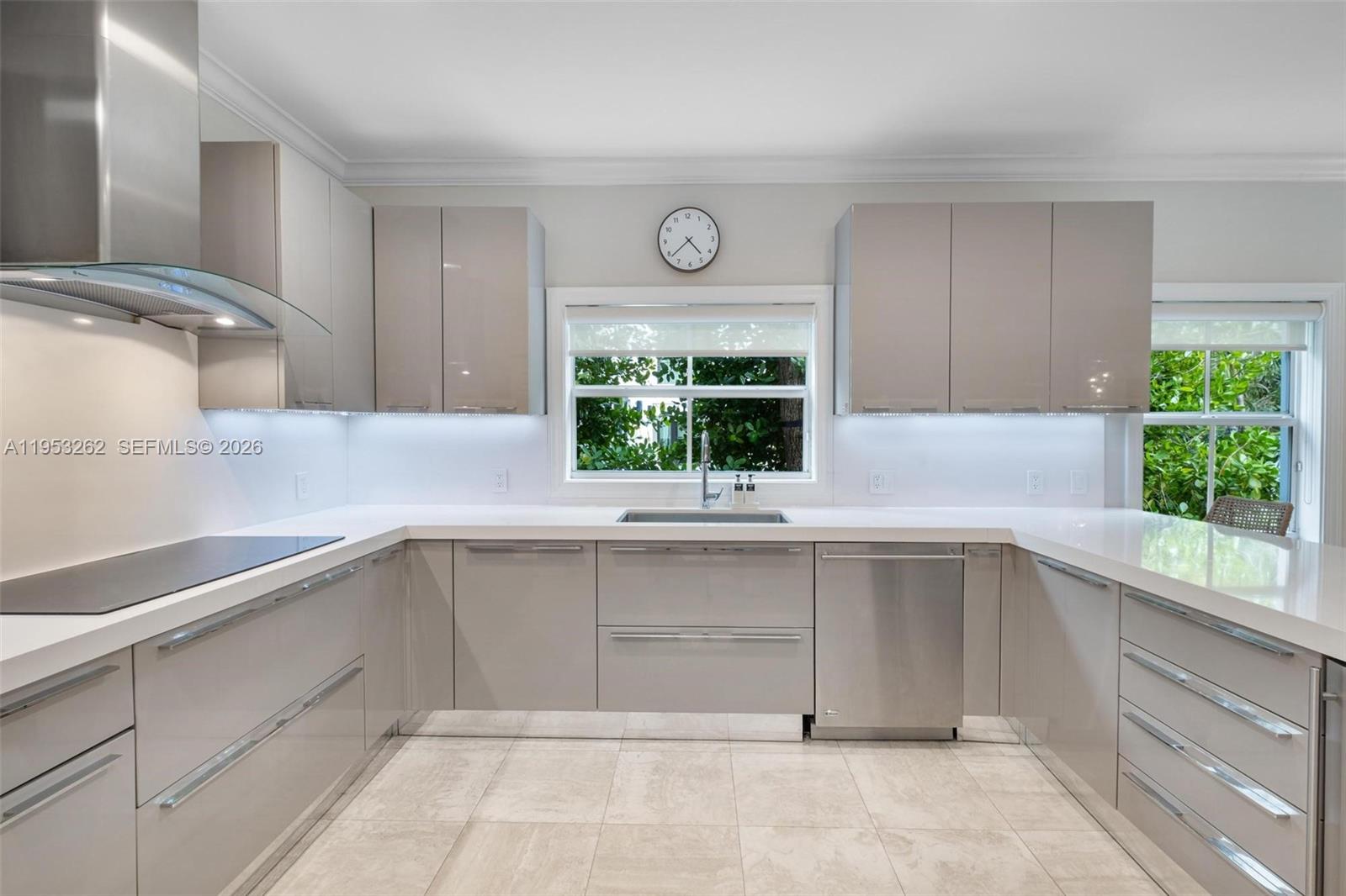 164 West Mashta Drive Key Biscayne, FL 33149 - Photo 12 of 34 a kitchen with a cabinets and window