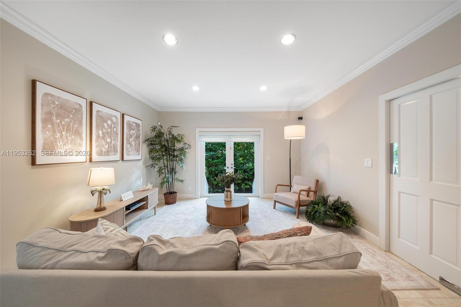 164 West Mashta Drive Key Biscayne, FL 33149 - Photo 14 of 34 a living room with furniture and a potted plant