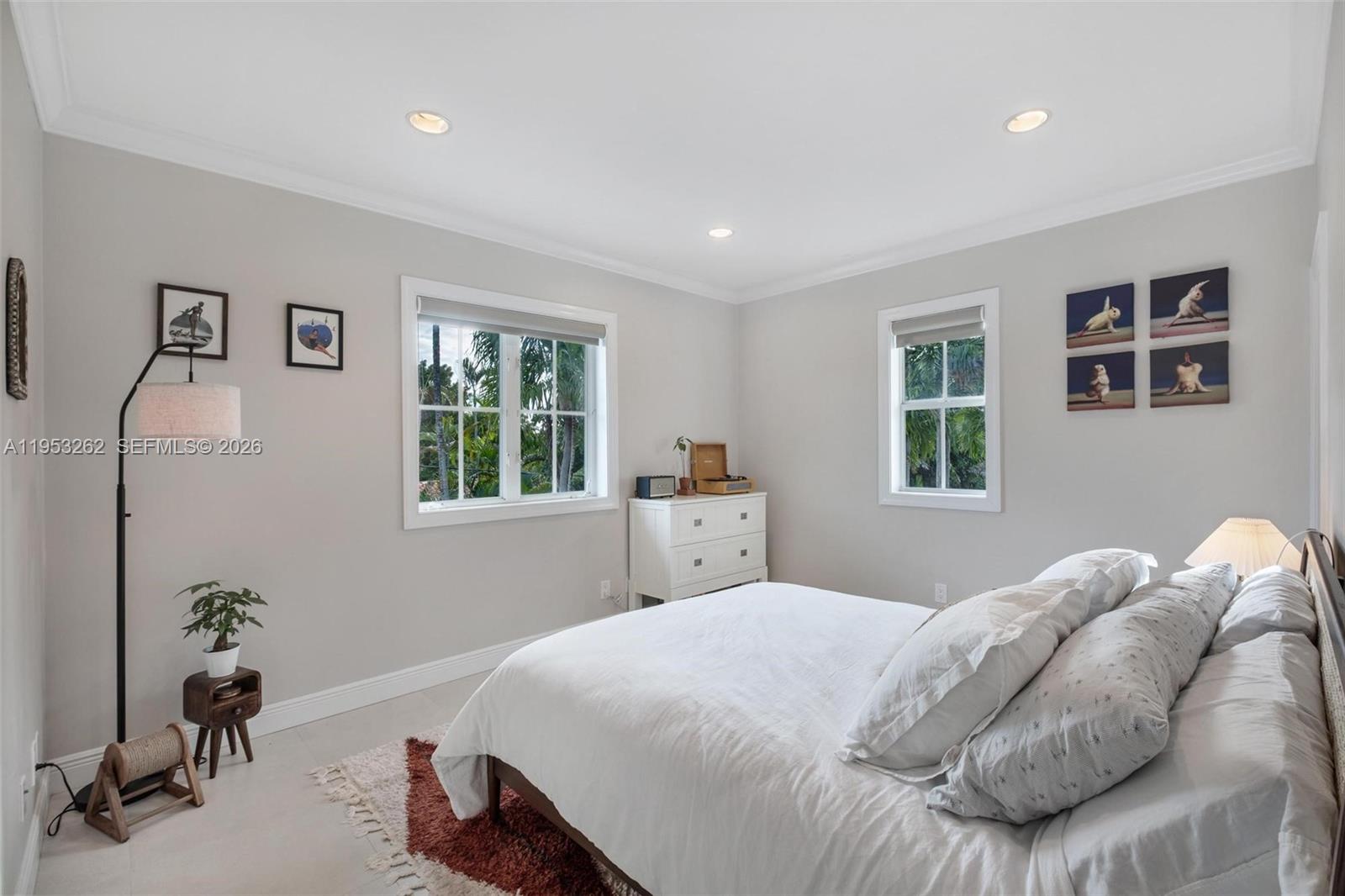 164 West Mashta Drive Key Biscayne, FL 33149 - Photo 22 of 34 a bedroom with a bed and a window
