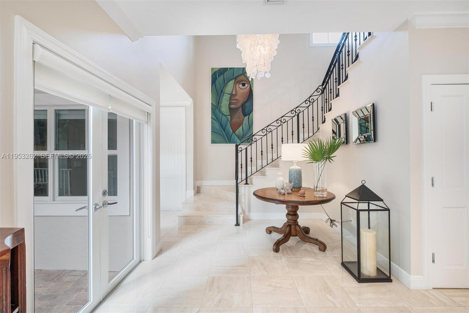 164 West Mashta Drive Key Biscayne, FL 33149 - Photo 6 of 34 a view of entryway with pool and windows