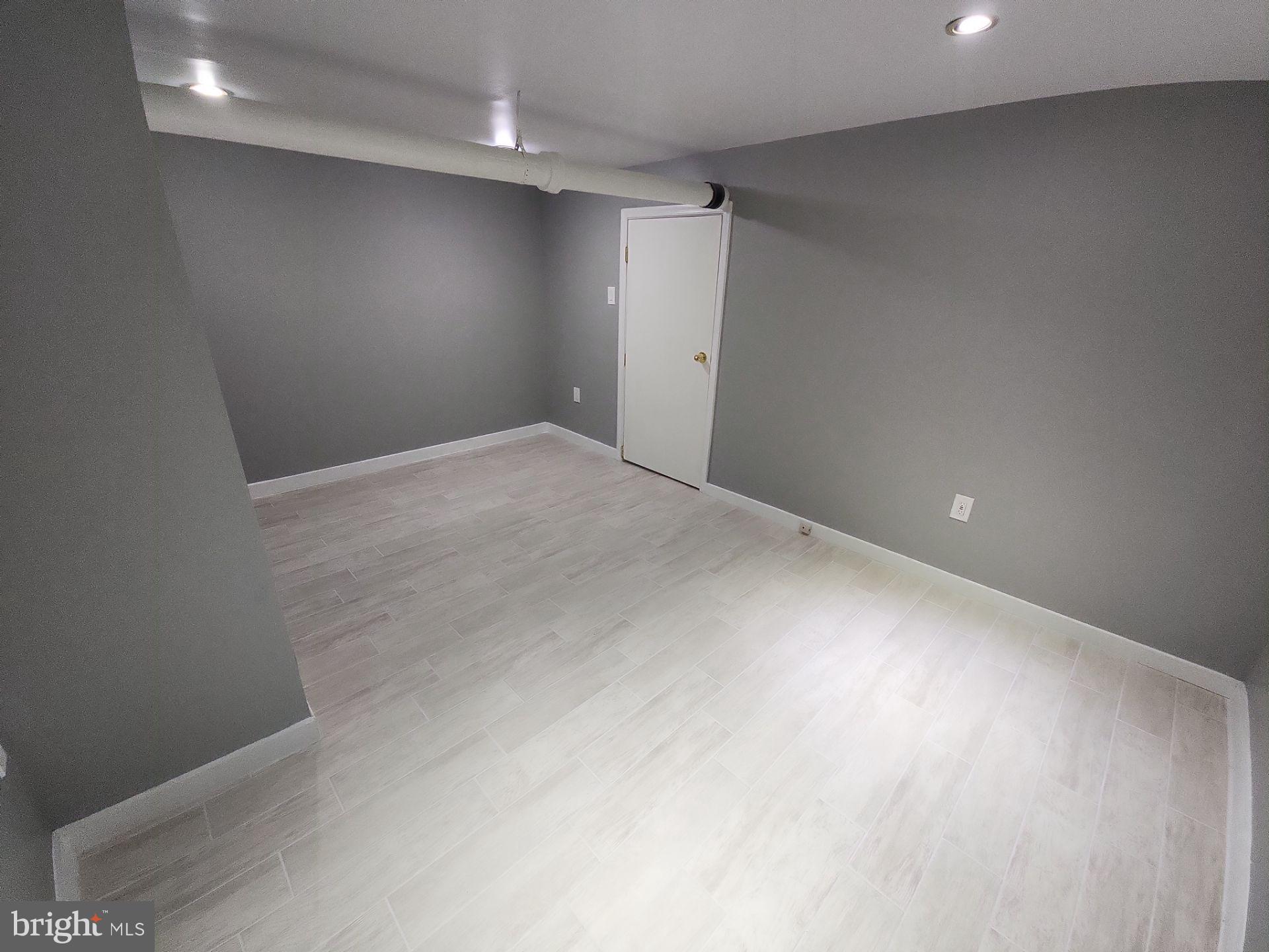 12024 Veirs Mill Road Silver Spring, MD 20906 - Photo 17 of 22 a view of empty room