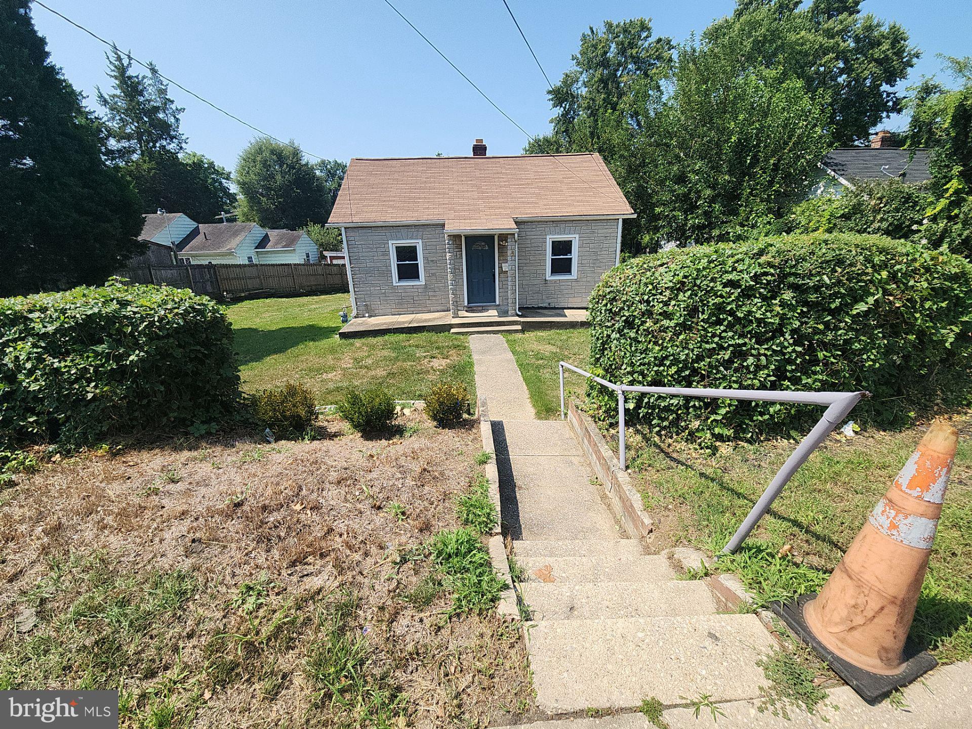 12024 Veirs Mill Road Silver Spring, MD 20906 - Photo 2 of 22 a view of a house with backyard