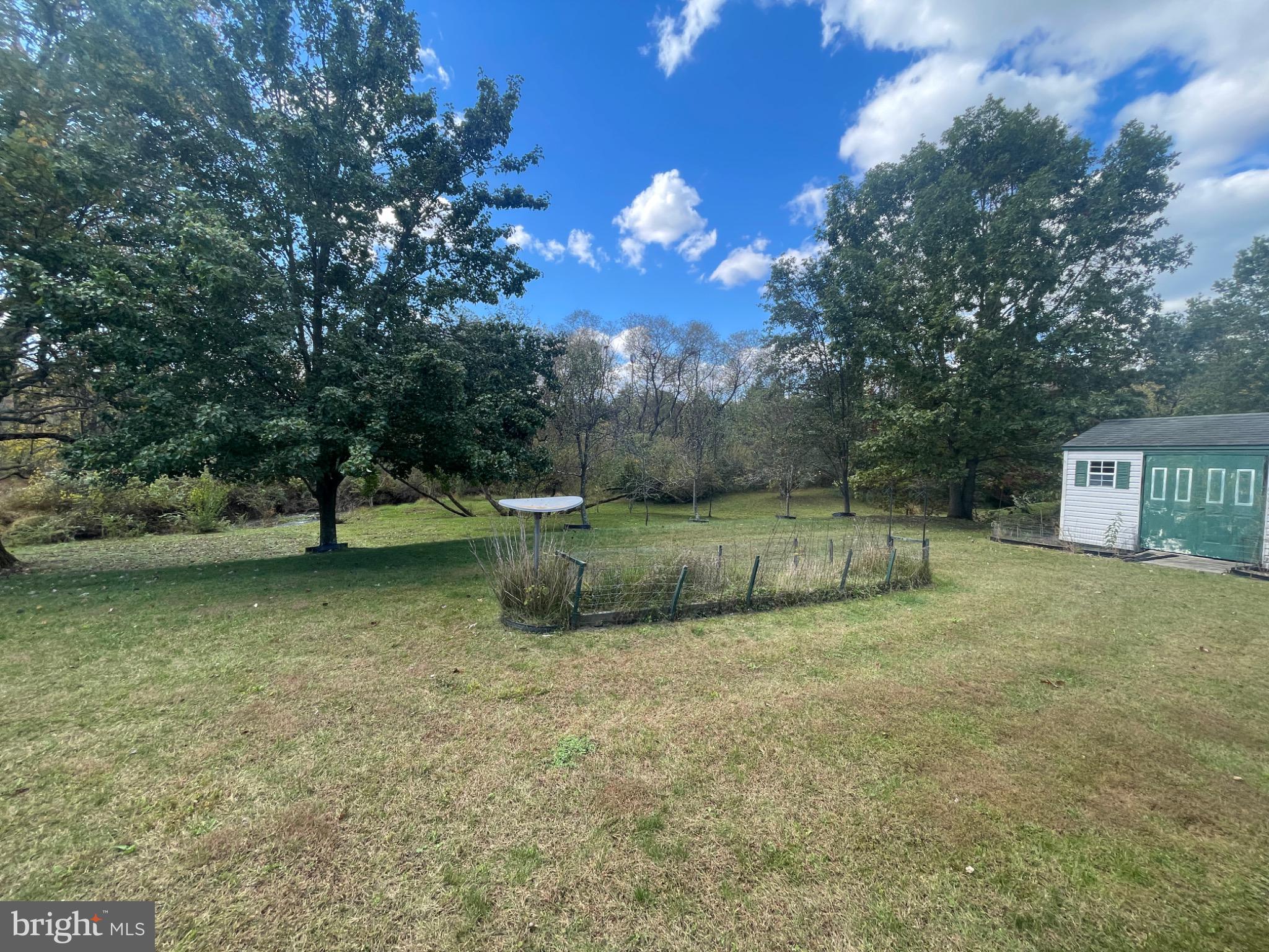 848 Trestle Court Pine Grove, PA 17963 - Photo 5 of 18 Serene landscape with lush greenery and sky.