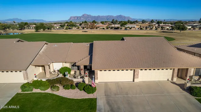 an aerial view of a house with a garden