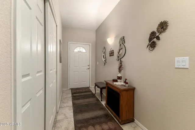 a hallway with white walls