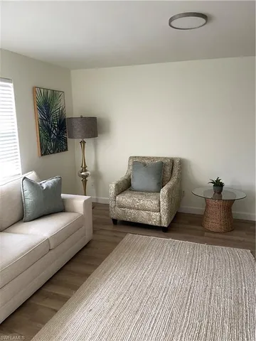 a living room with furniture and a couch
