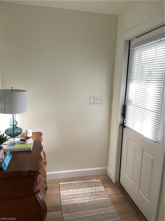 1471 Mandarin Road Naples, FL 34102 - Photo 10 of 28 a room with a window