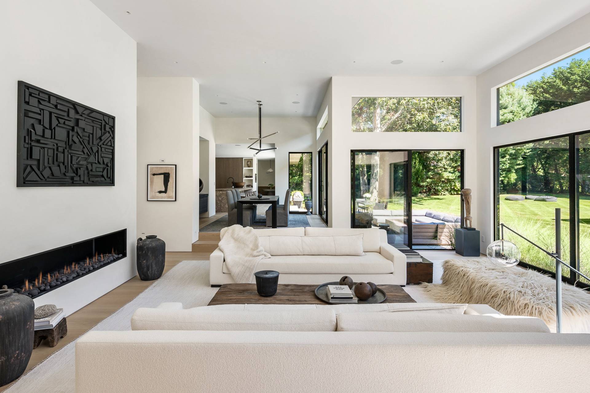 311 Georgica Road East Hampton, NY 11937 - Photo 23 of 41 a living room with furniture large window and flat screen tv