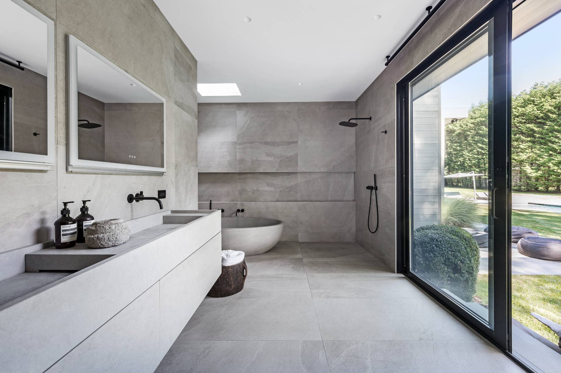 311 Georgica Road East Hampton, NY 11937 - Photo 30 of 41 a bathroom with a double vanity sink toilet and mirror