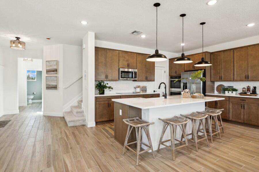 184 Southeast Birch Terrace Stuart, FL 34997 - Photo 7 of 46 Kitchen and Foyer