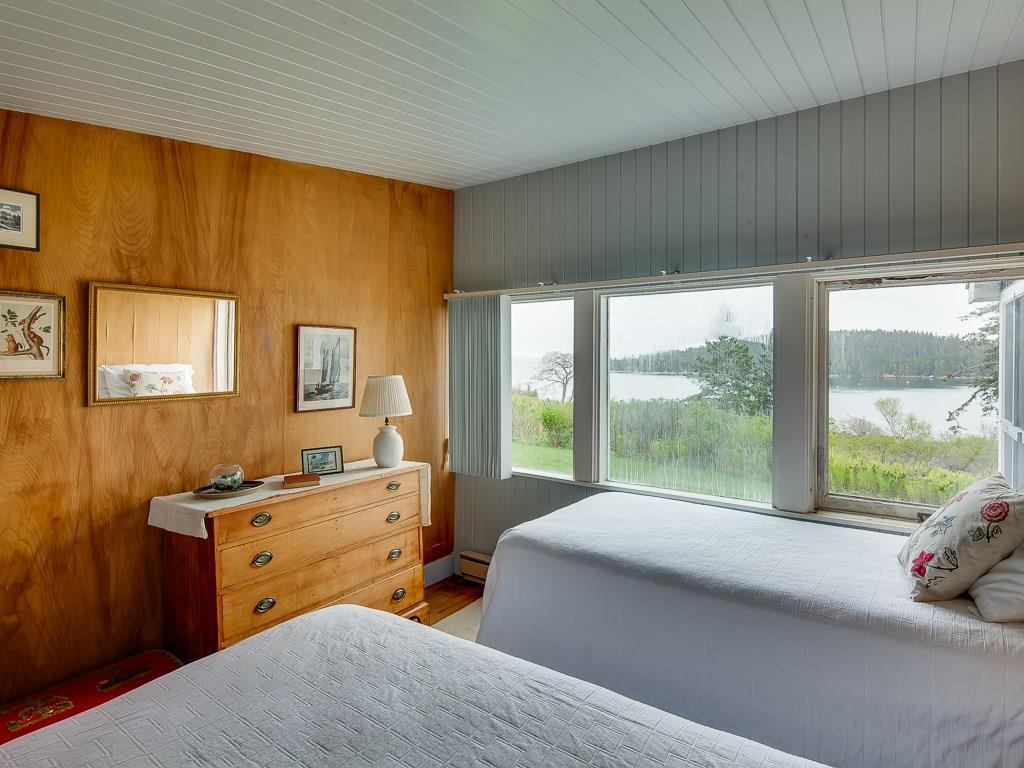 9 E Road Brooklin, ME 04616 - Photo 20 of 30 bedroom 2 - note matched wood panels