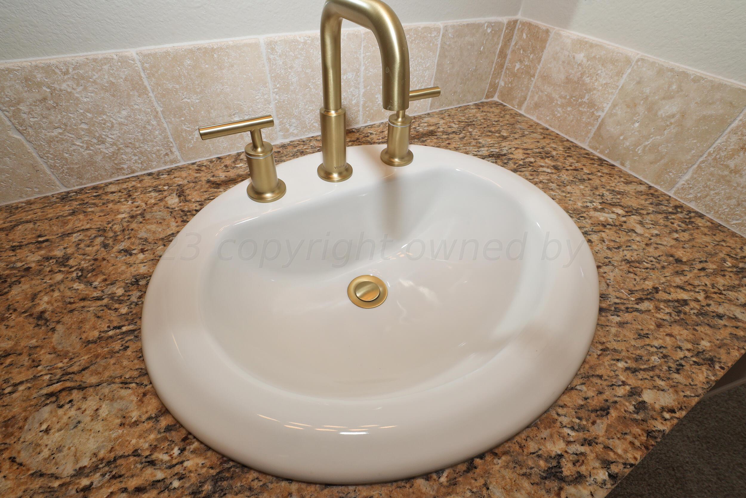 4902 Locker Street Amarillo, TX 79118 - Photo 18 of 23 Master Bath Gold Fixtures