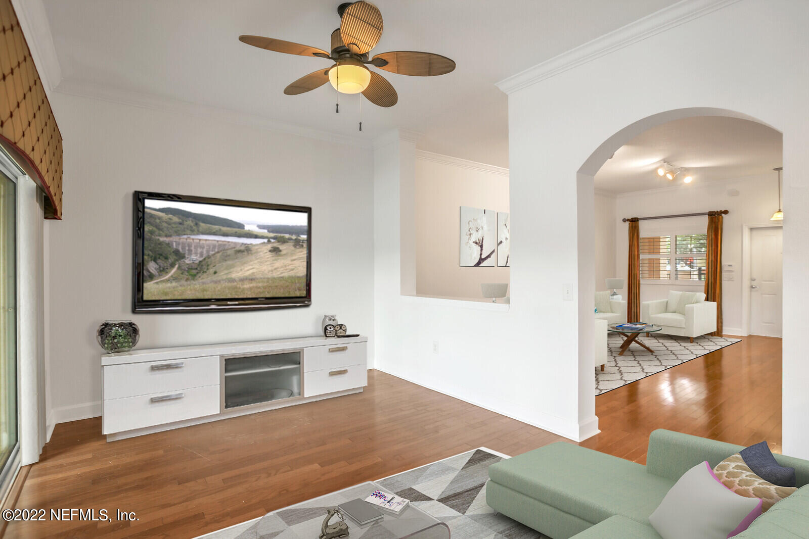 9745 Touchton Road, Unit 2806 Jacksonville, FL 32246 - Photo 15 of 32 a living room with furniture and a flat screen tv