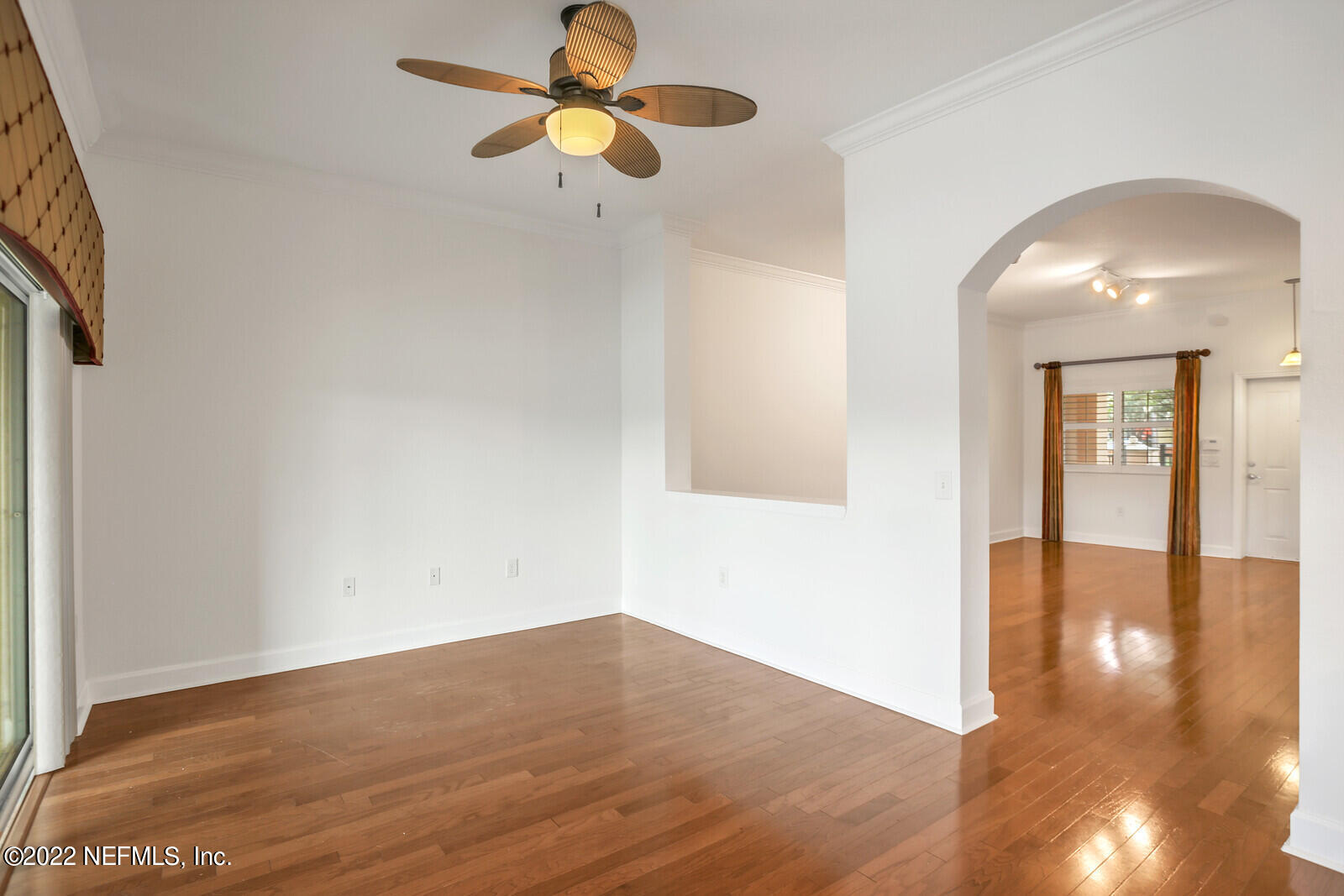 9745 Touchton Road, Unit 2806 Jacksonville, FL 32246 - Photo 18 of 32 a view of an empty room with wooden floor