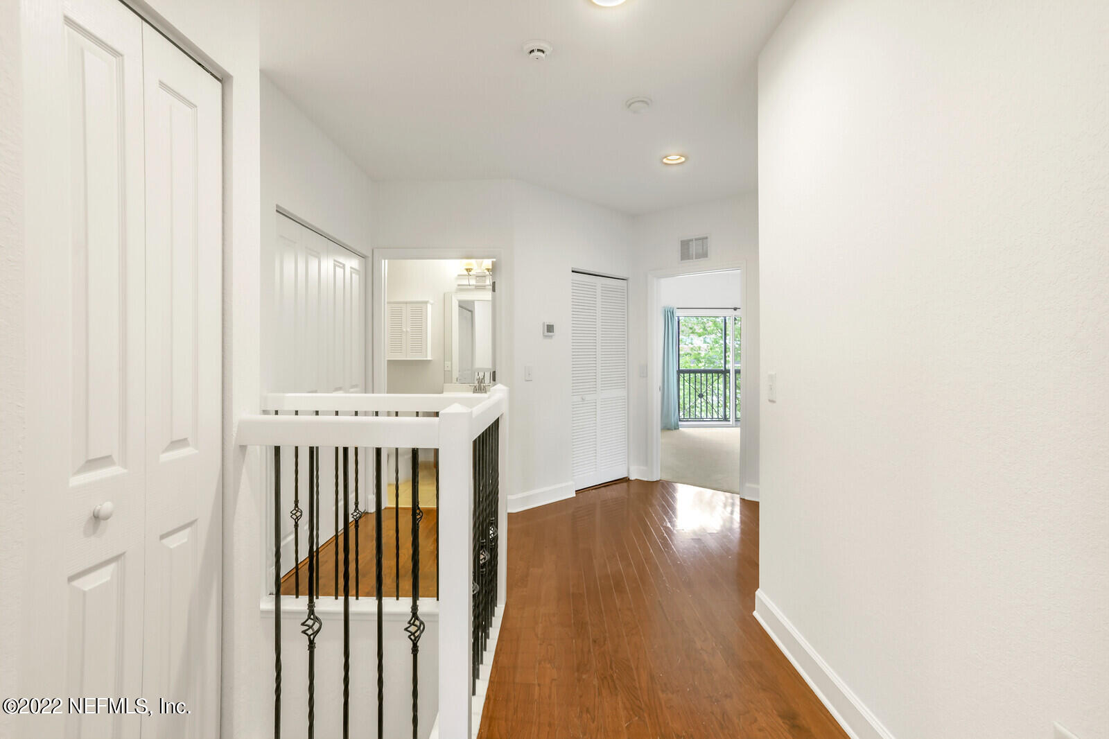9745 Touchton Road, Unit 2806 Jacksonville, FL 32246 - Photo 22 of 32 a view of hallway with wooden floor