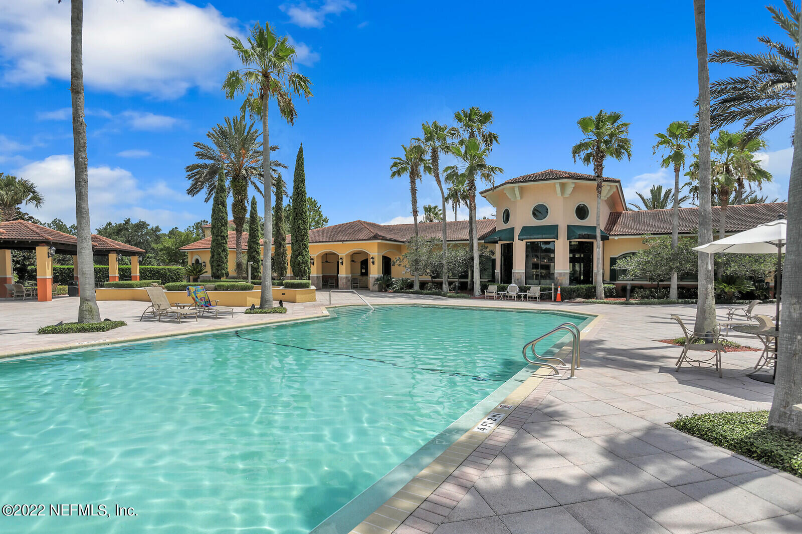9745 Touchton Road, Unit 2806 Jacksonville, FL 32246 - Photo 3 of 32 a view of a house with garden and a tree