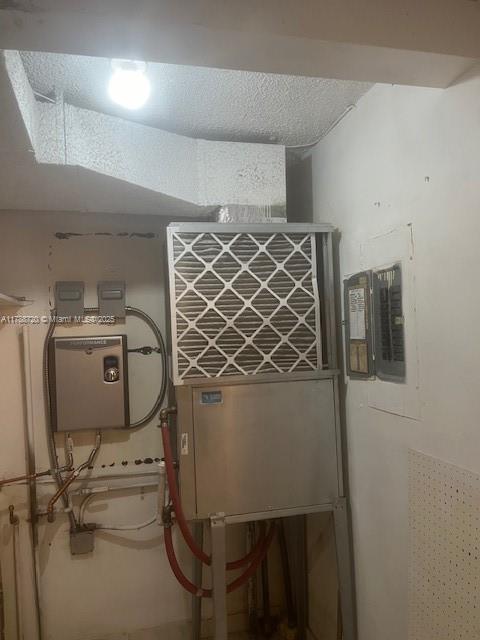 800 Northeast 195th Street, Unit 701 Miami, FL 33179 - Photo 12 of 14 a utility room with dryer and washer