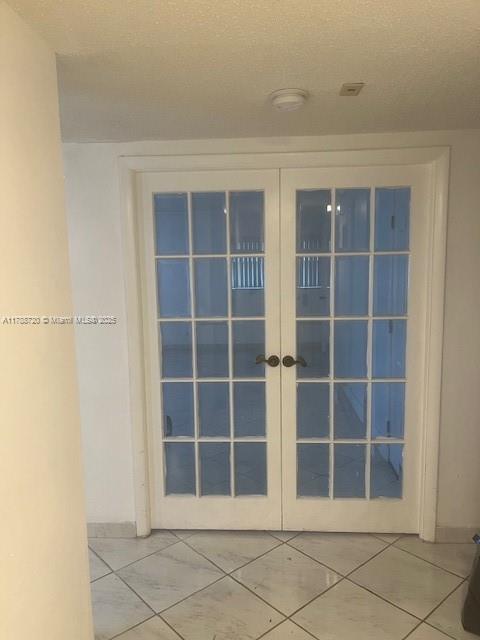 800 Northeast 195th Street, Unit 701 Miami, FL 33179 - Photo 3 of 14 a view of an empty room with empty shelves