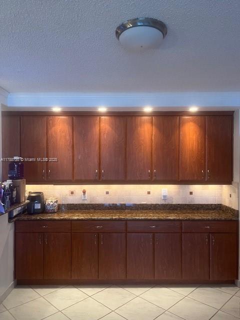 800 Northeast 195th Street, Unit 701 Miami, FL 33179 - Photo 5 of 14 a view of kitchen with granite countertop cabinets