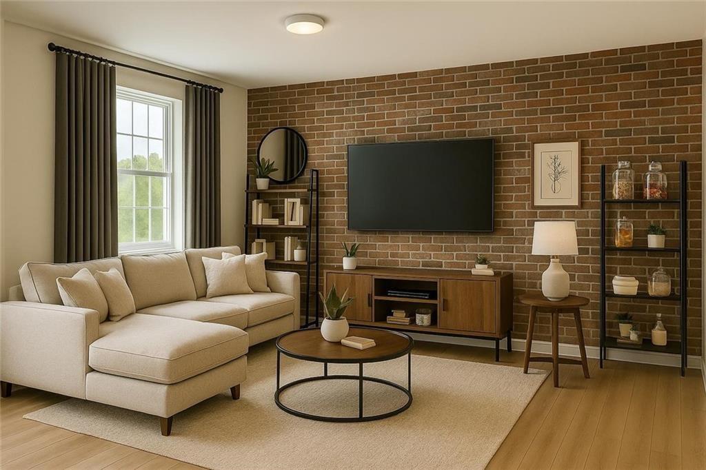 20 Sherwood Drive Commerce, GA 30529 - Photo 5 of 10 a living room with furniture flat screen tv and a fireplace