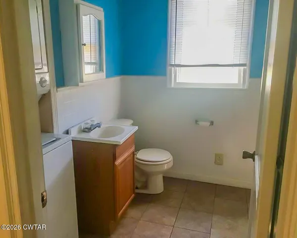 a bathroom with a sink and a toilet