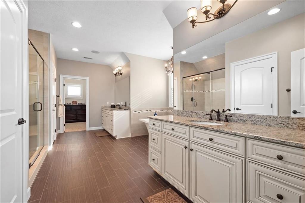 200 Durrow Court Mars, PA 16046 - Photo 23 of 50 a bathroom with a double vanity sink and mirror