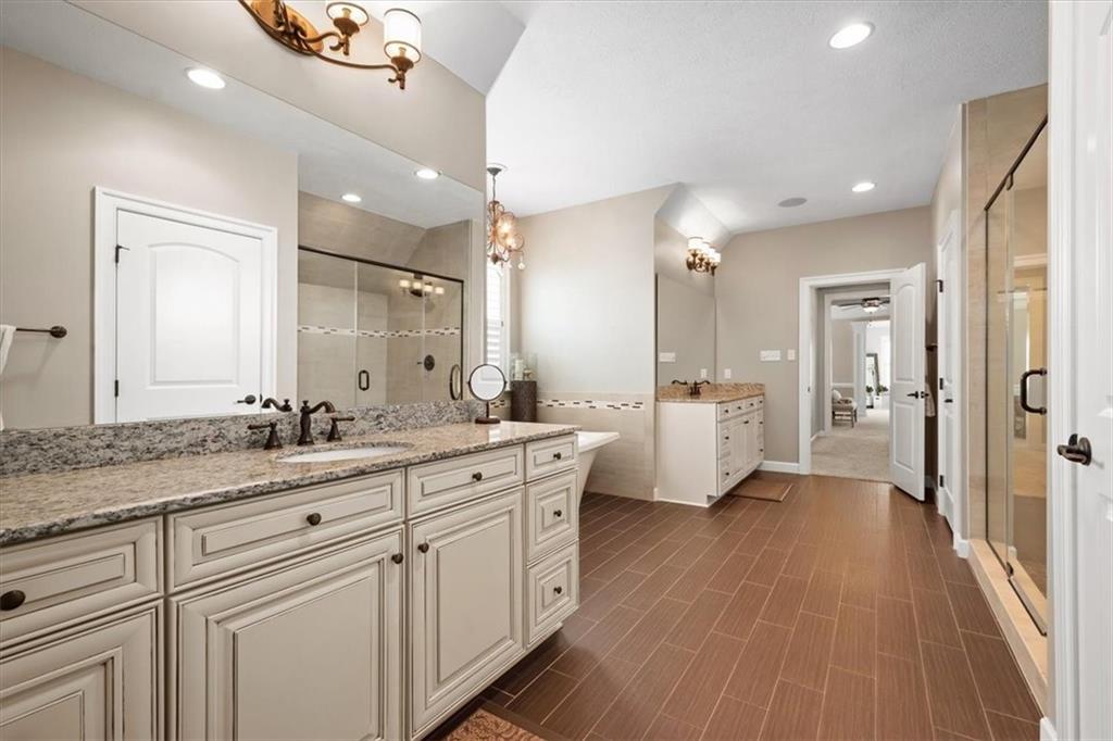 200 Durrow Court Mars, PA 16046 - Photo 24 of 50 a bathroom with a double vanity sink and mirror
