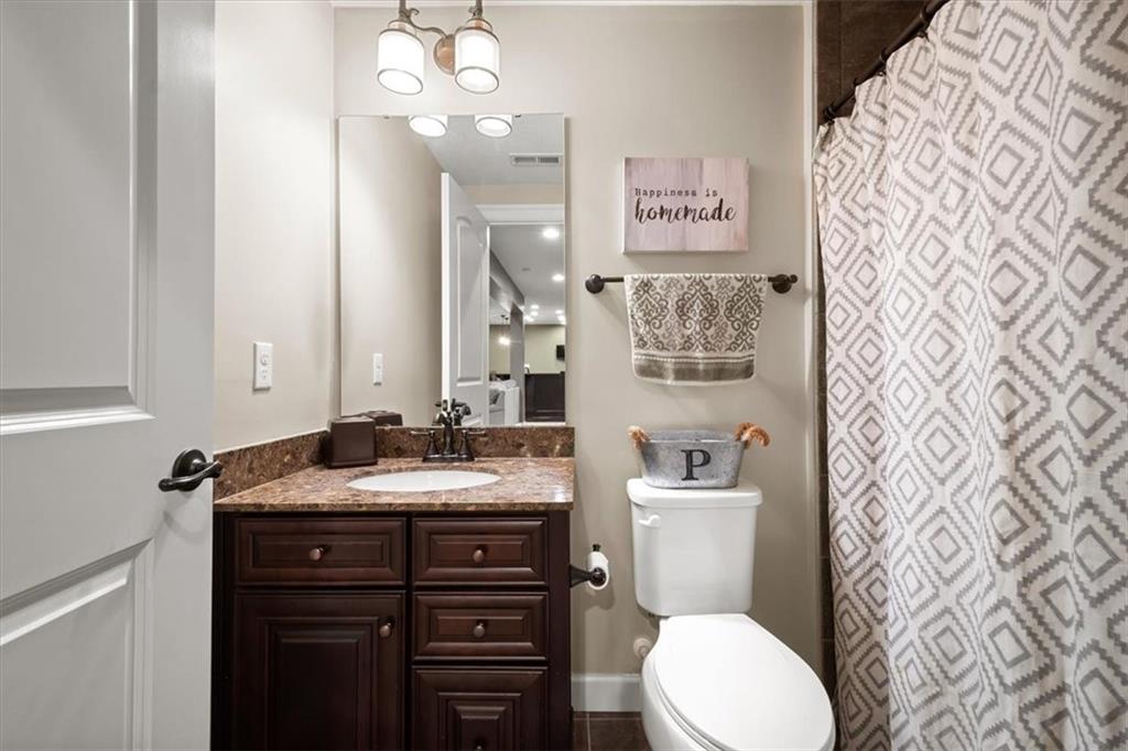 200 Durrow Court Mars, PA 16046 - Photo 39 of 50 a bathroom with a granite countertop toilet sink and mirror