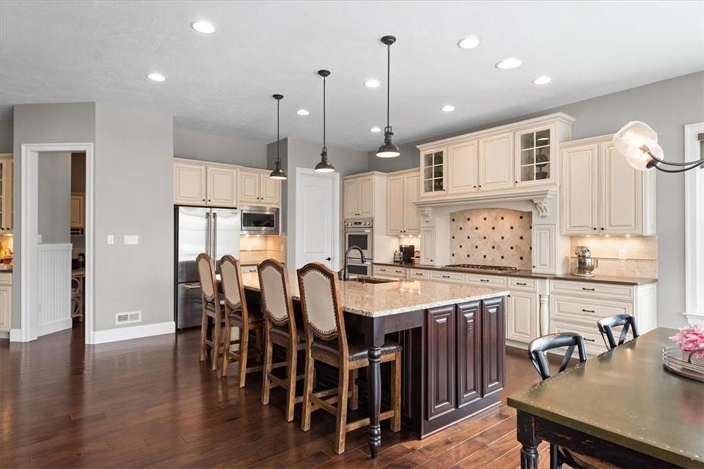 200 Durrow Court Mars, PA 16046 - Photo 5 of 50 a large kitchen with a table and chairs