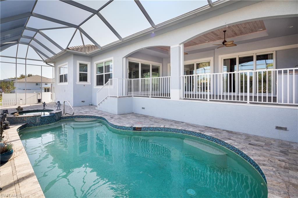 451 Oak Avenue Naples, FL 34108 - Photo 19 of 25 a view of a house with pool and sitting area