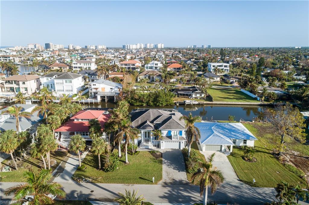 451 Oak Avenue Naples, FL 34108 - Photo 23 of 25 an aerial view of residential houses with outdoor space and swimming pool