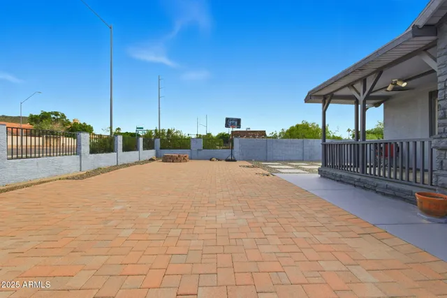 a view of balcony with wooden floor