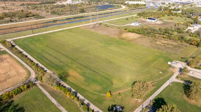 a view of a swimming pool and an outdoor space