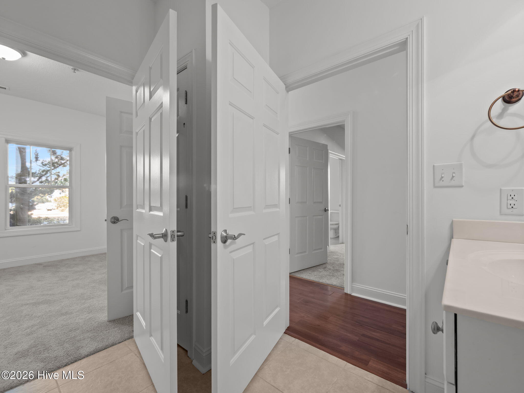 200 Lighthouse Lane, Unit A1 Cedar Point, NC 28584 - Photo 15 of 33 Entrance to guest bedroom and hallway