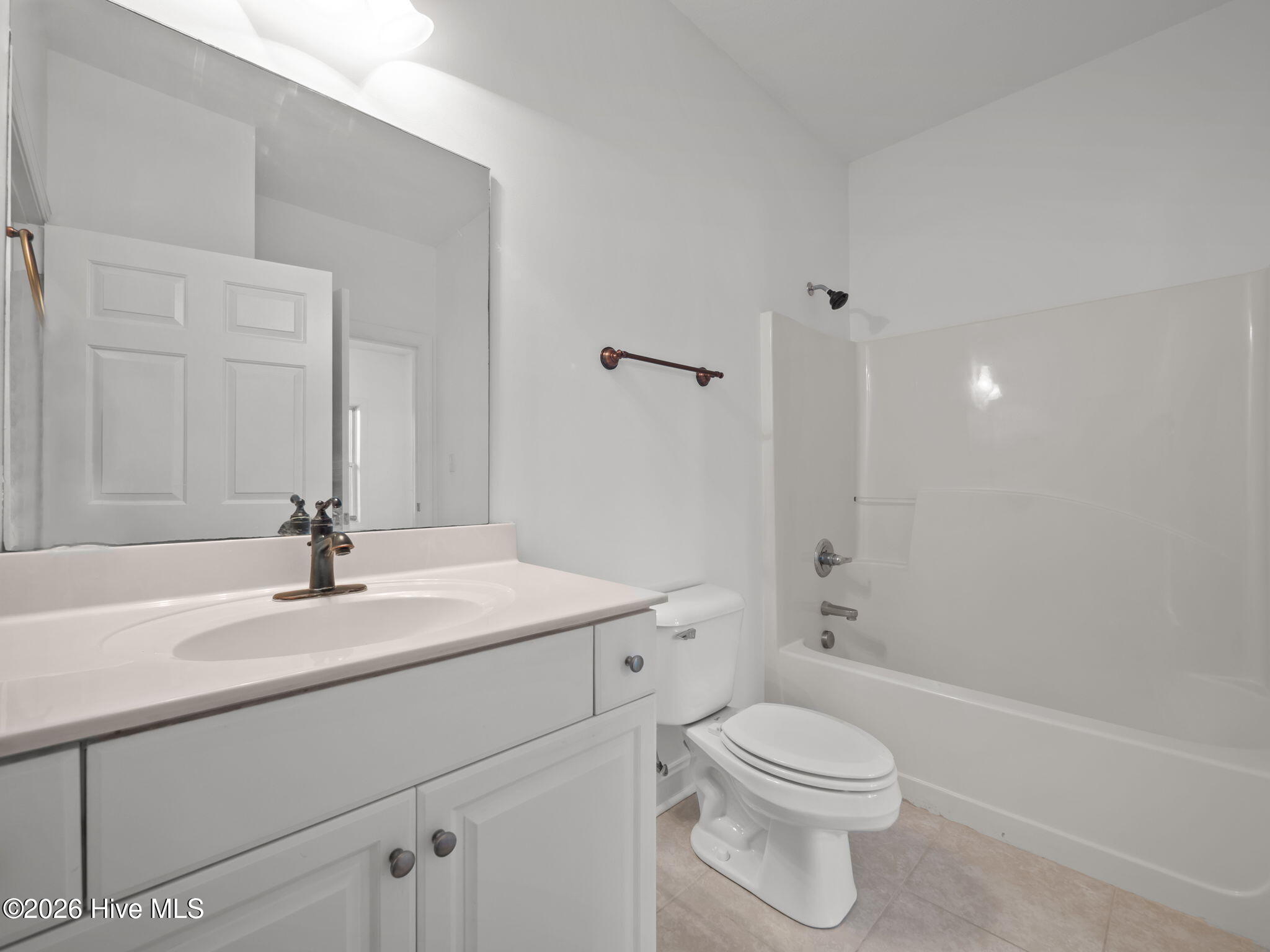 200 Lighthouse Lane, Unit A1 Cedar Point, NC 28584 - Photo 17 of 34 GUEST BATHROOM ENSUITE