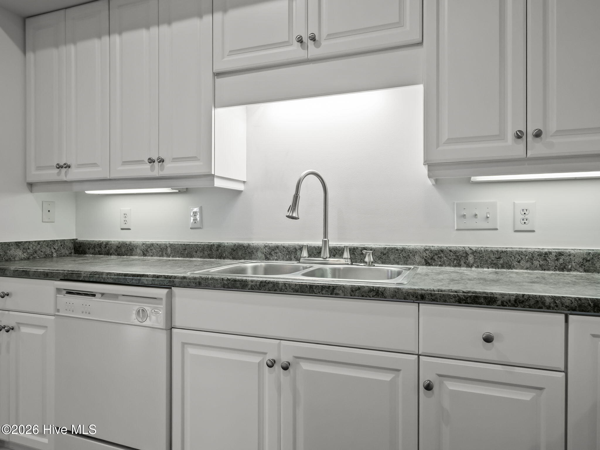 200 Lighthouse Lane, Unit A1 Cedar Point, NC 28584 - Photo 19 of 33 SINK