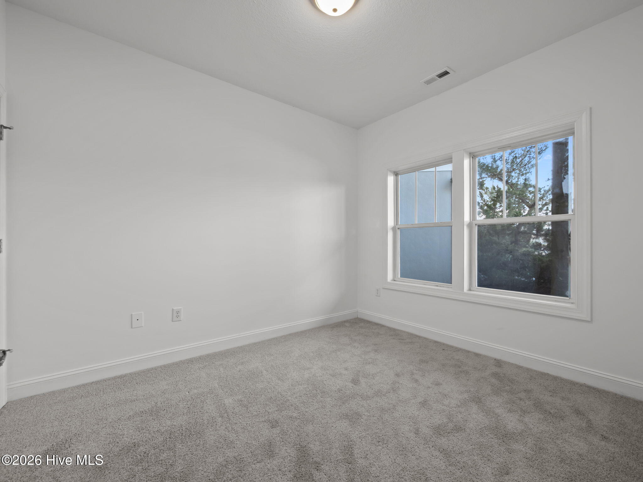 200 Lighthouse Lane, Unit A1 Cedar Point, NC 28584 - Photo 21 of 34 GUEST BEDROOM