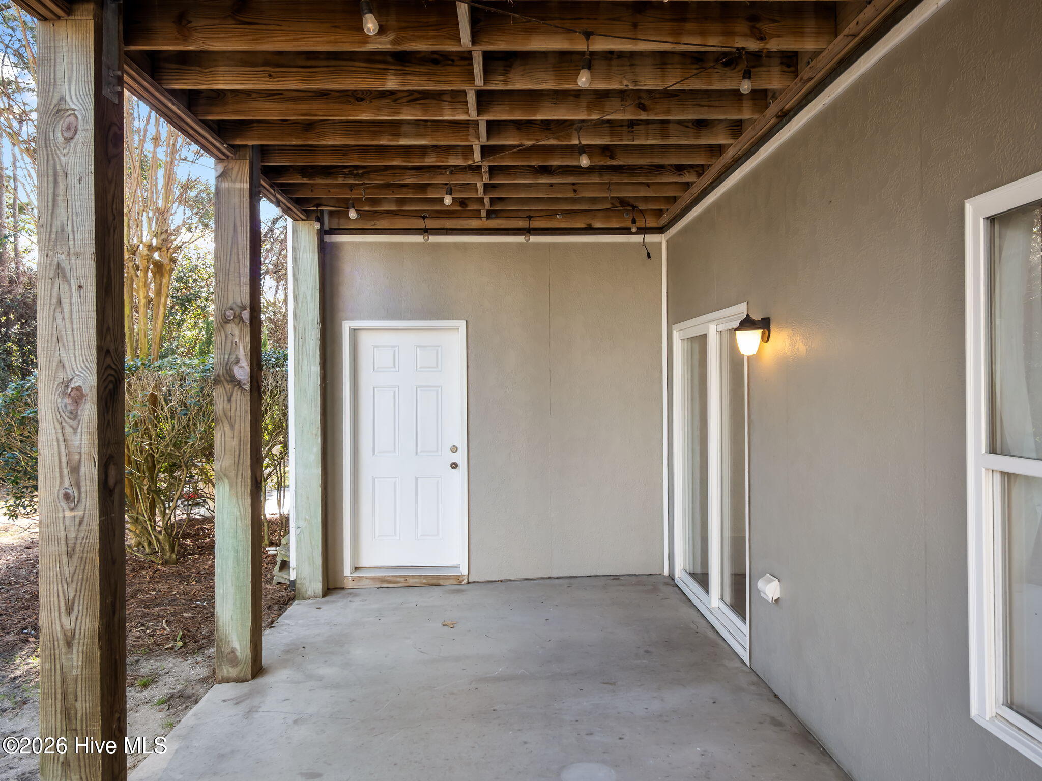 200 Lighthouse Lane, Unit A1 Cedar Point, NC 28584 - Photo 3 of 34 SPACIOUS PATIO WITH LARGE UTILITY CLOSET
