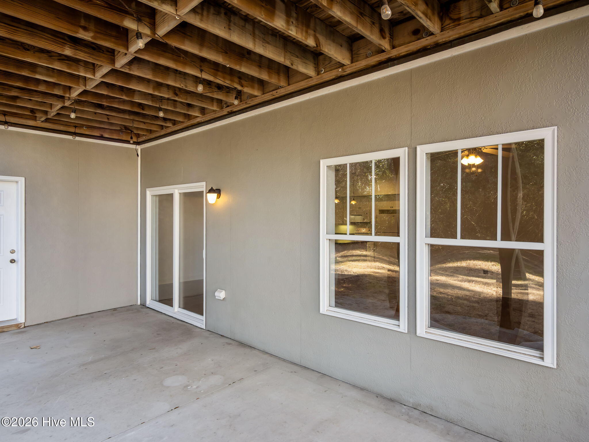 200 Lighthouse Lane, Unit A1 Cedar Point, NC 28584 - Photo 32 of 33 SLIDER TO PATIO