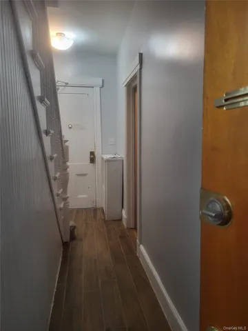 a view of a livingroom from a hallway