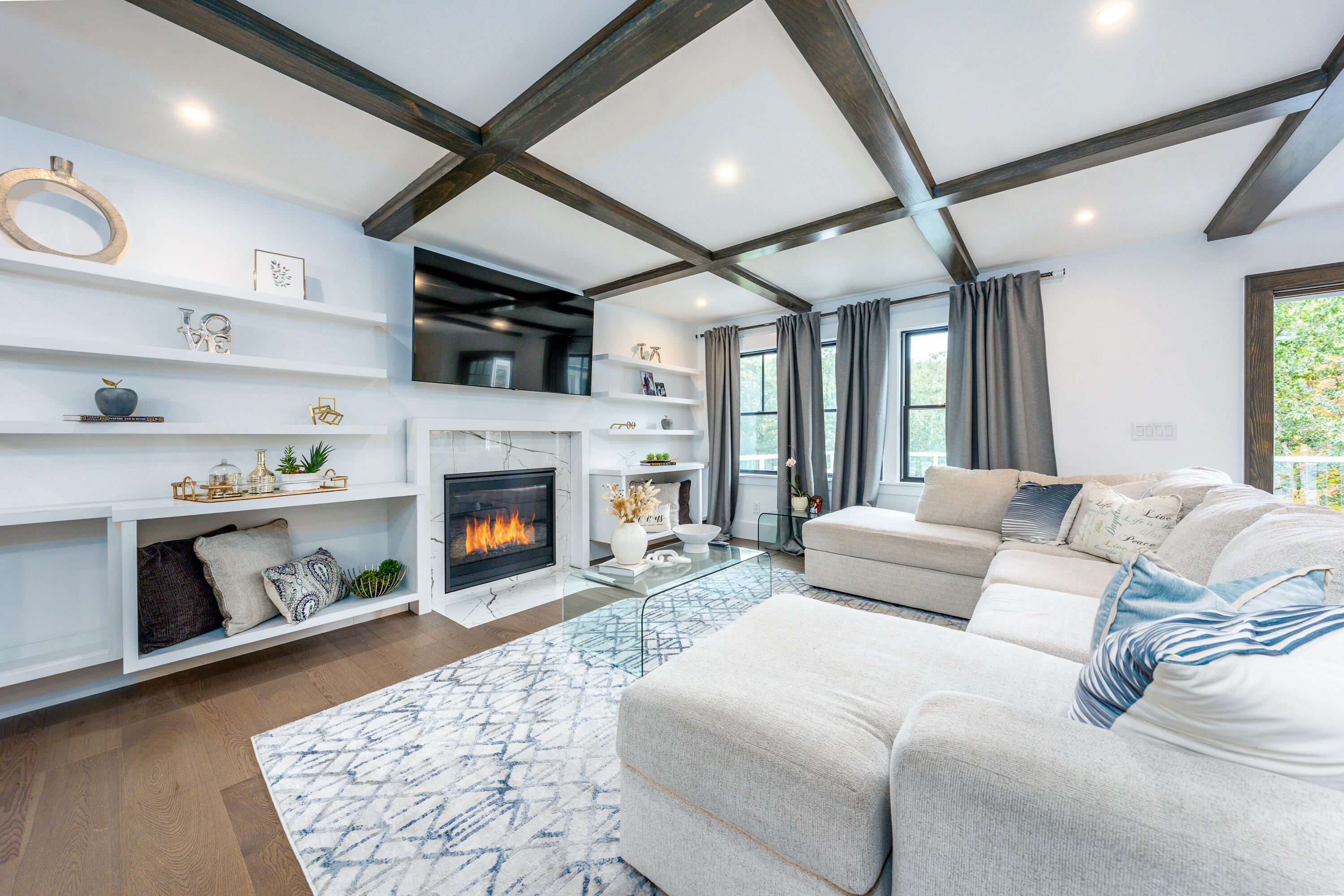 180 Kettle Hole Road West Barnstable, MA 02668 - Photo 12 of 53 a living room with furniture and a fireplace