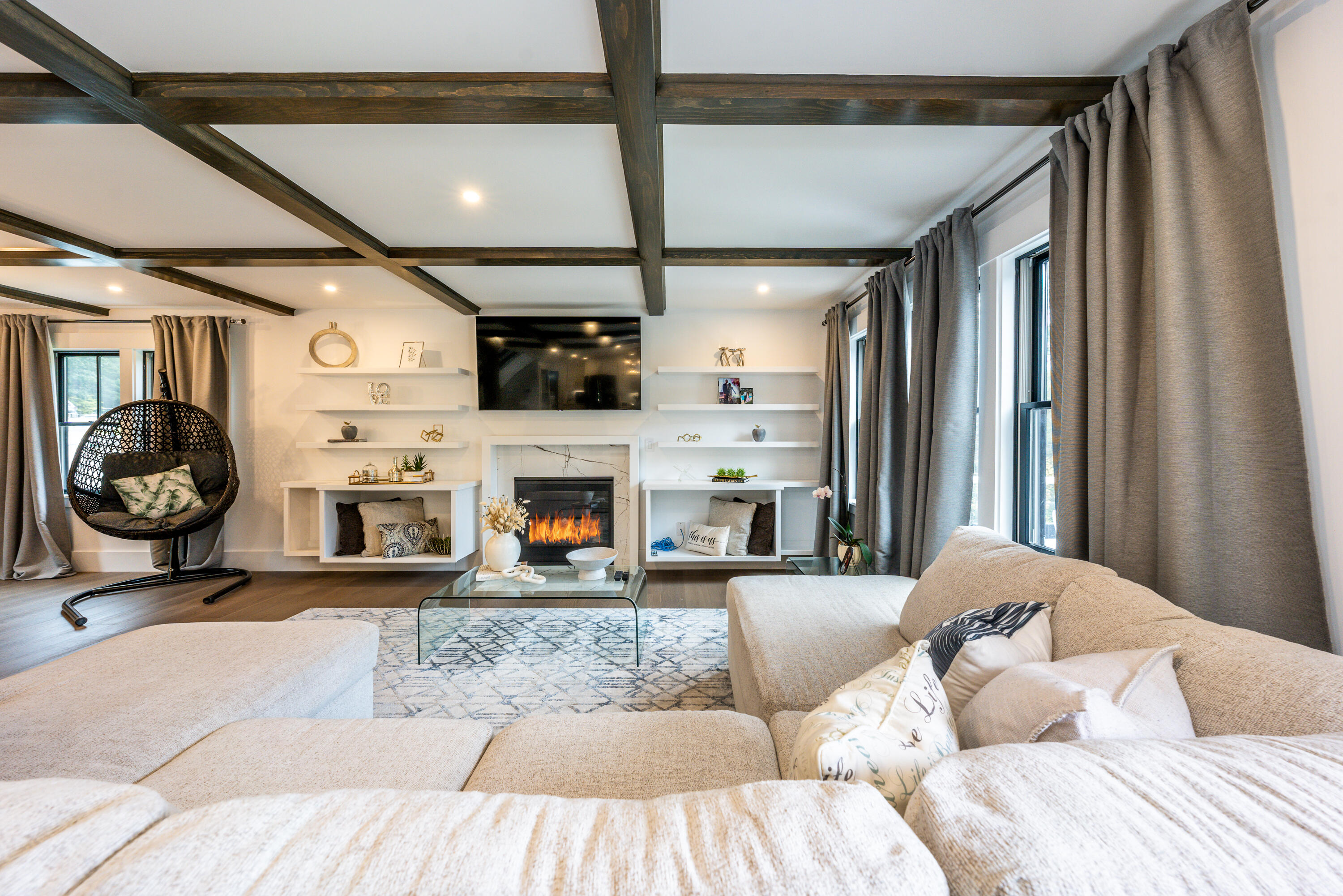 180 Kettle Hole Road West Barnstable, MA 02668 - Photo 13 of 53 a living room with furniture a fireplace and a flat screen tv