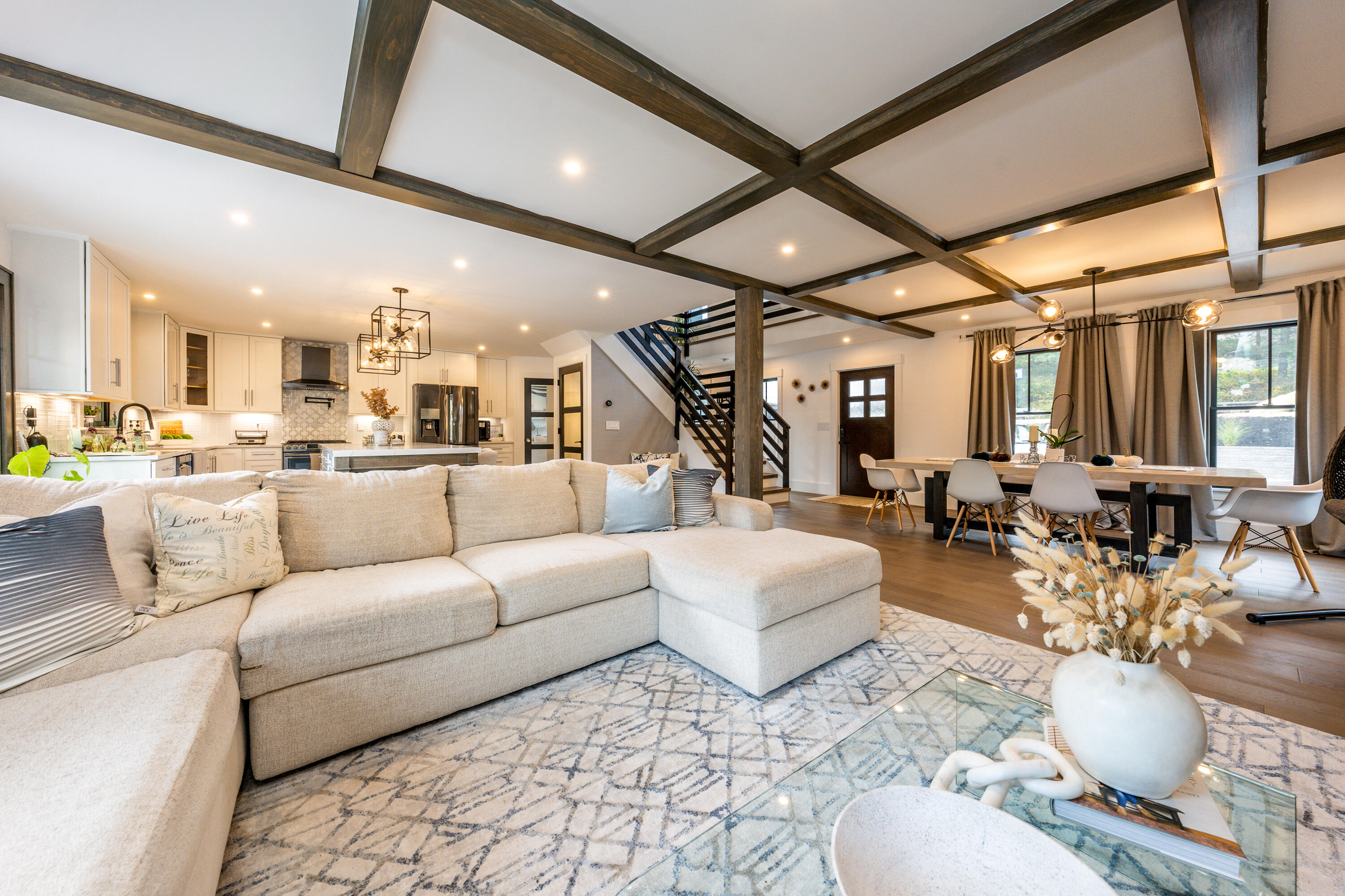 180 Kettle Hole Road West Barnstable, MA 02668 - Photo 14 of 53 a living room with furniture and a chandelier