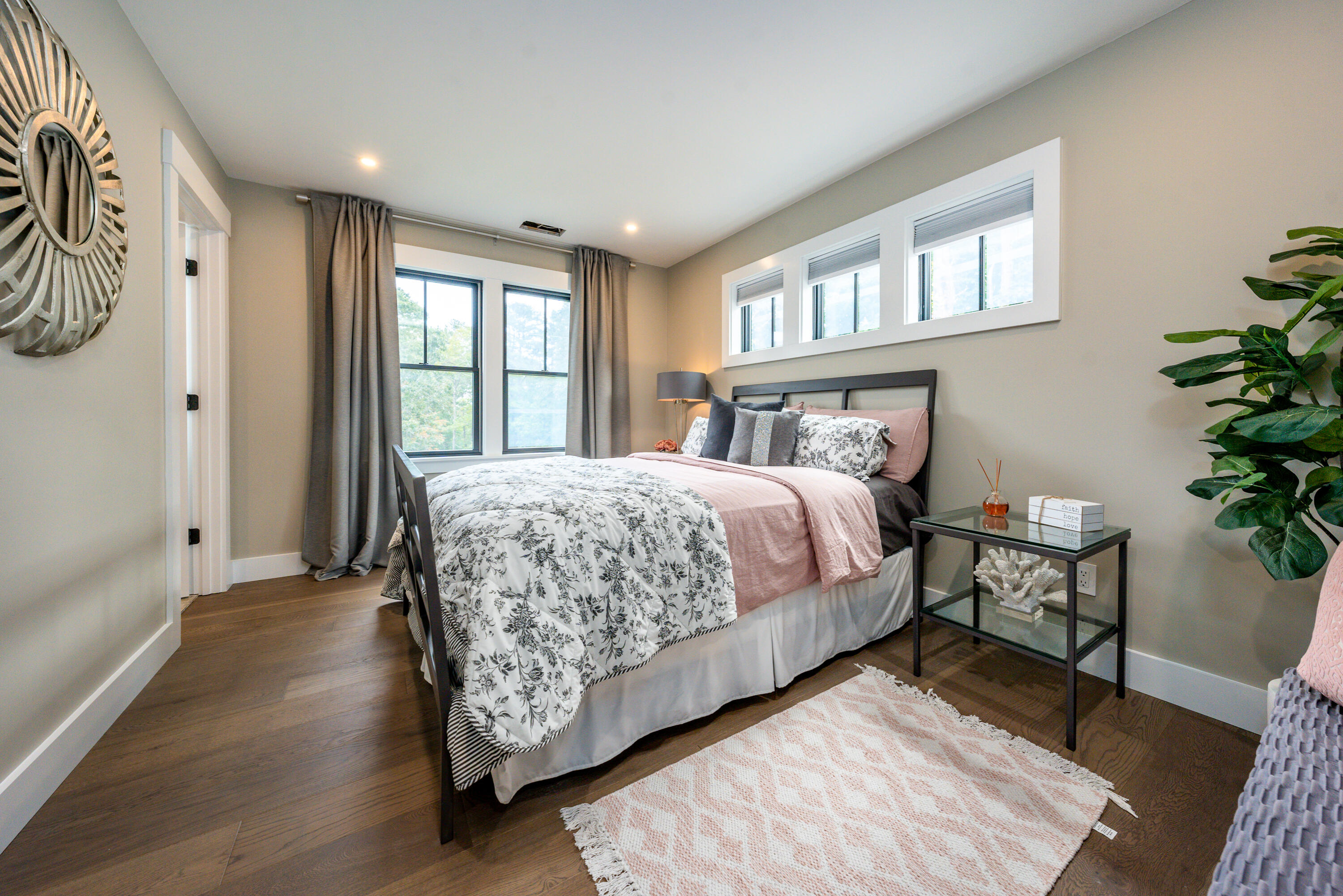 180 Kettle Hole Road West Barnstable, MA 02668 - Photo 19 of 53 a bedroom with a large bed and a potted plant